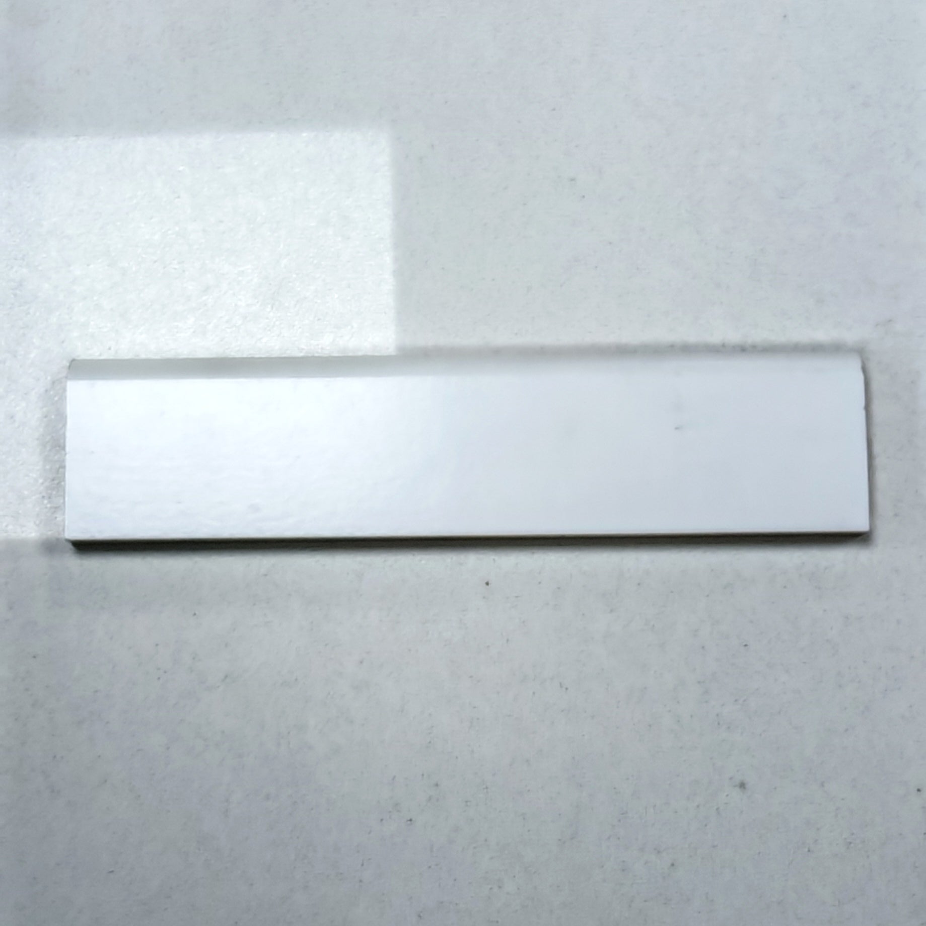 Guardapolvo MDF Laminado Veta Madera Blanco 12mm x 70mm x 2.4m