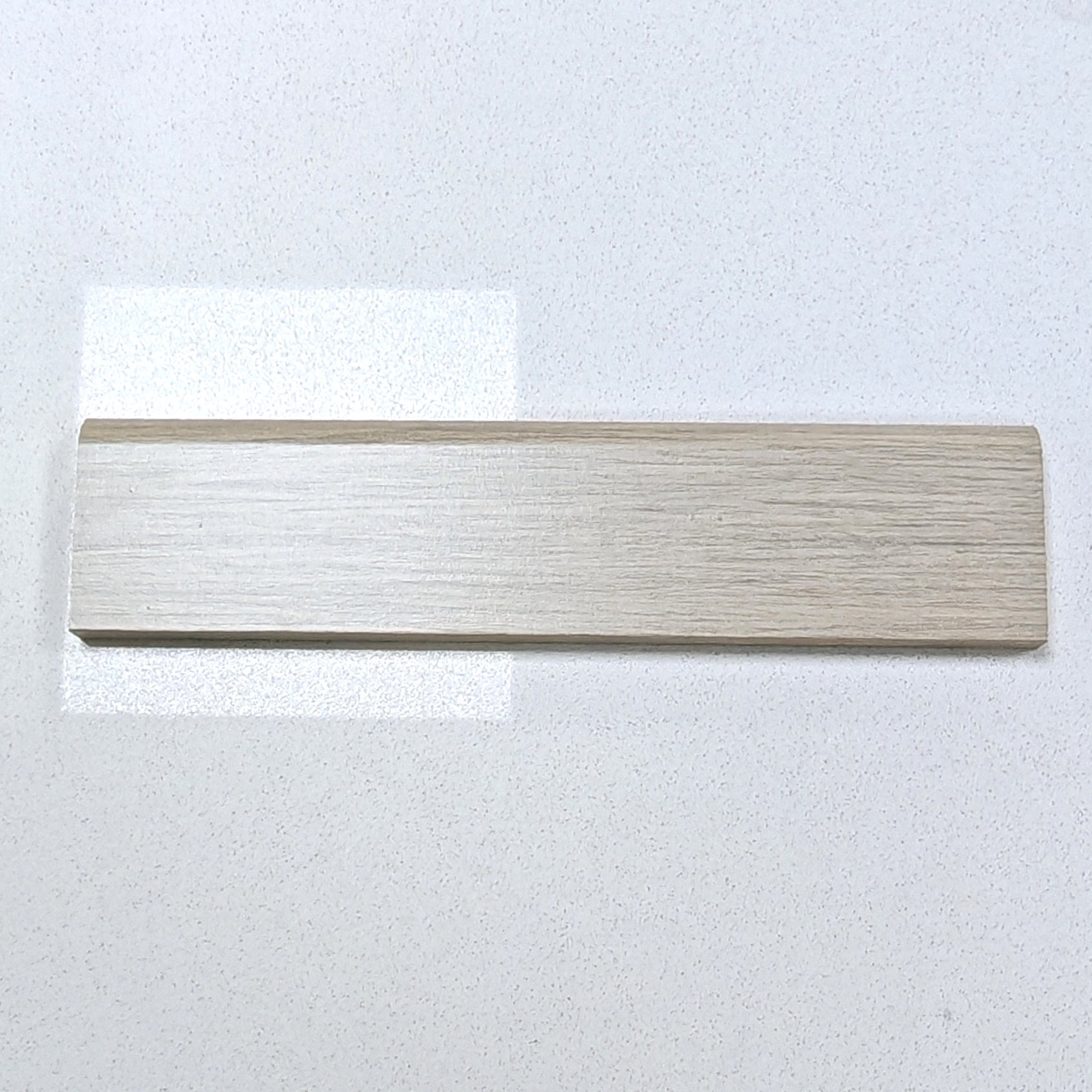 Guardapolvo MDF Laminado veta madera Kobe Avorio 12mm x 70mm x 2.4m