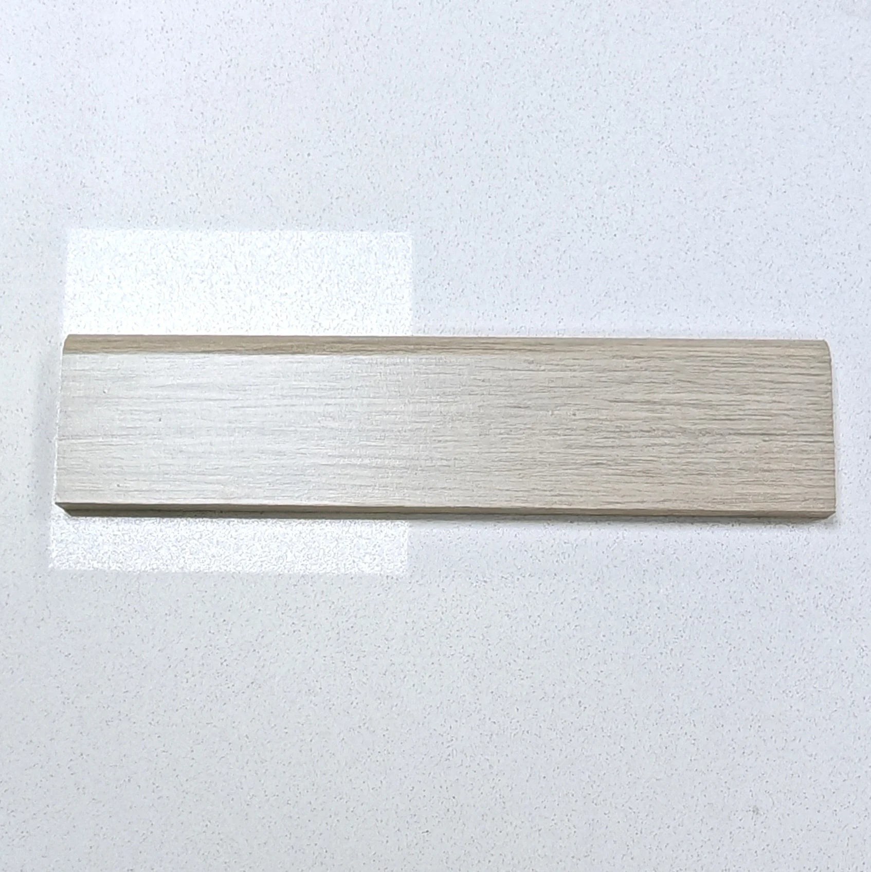 Guardapolvo MDF Laminado veta madera Kobe Avorio 12mm x 70mm x 2.4m